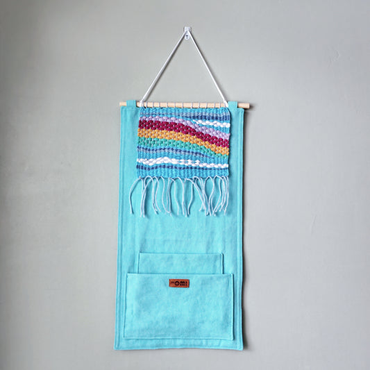 KÄTKÖ Rainbow Handwoven Wall Pocket – Nordic Textile Wall Hanging with Storage