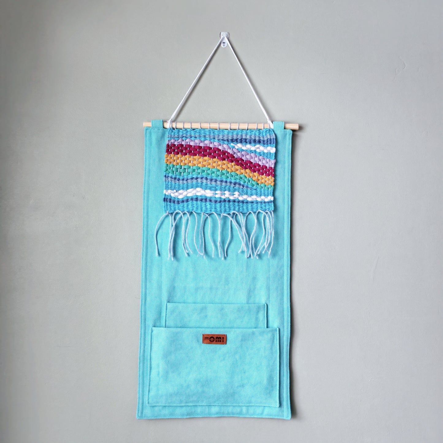KÄTKÖ Rainbow Handwoven Wall Pocket – Nordic Textile Wall Hanging with Storage