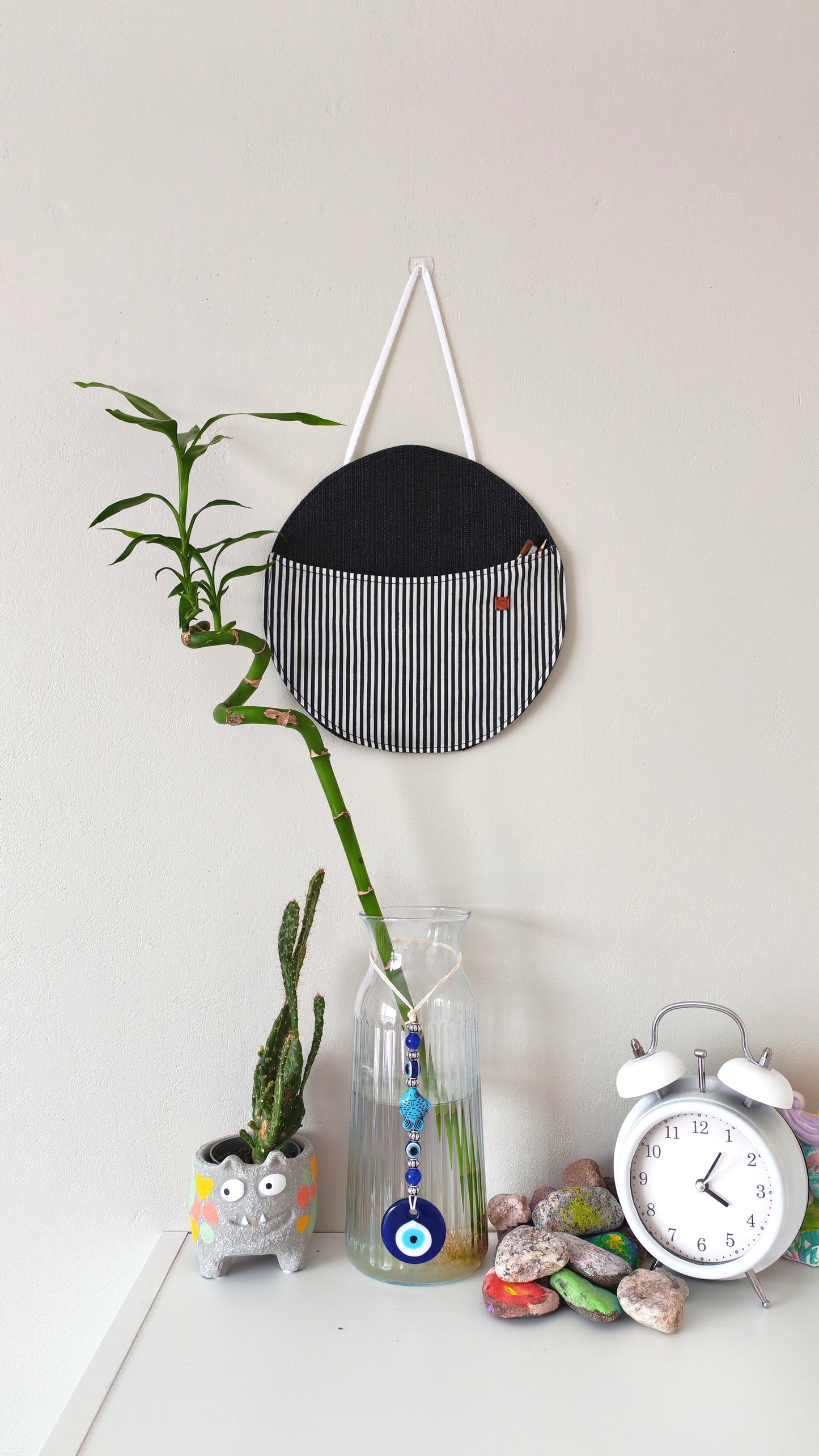 KÄTKÖ Pyöreä pieni seinätasku