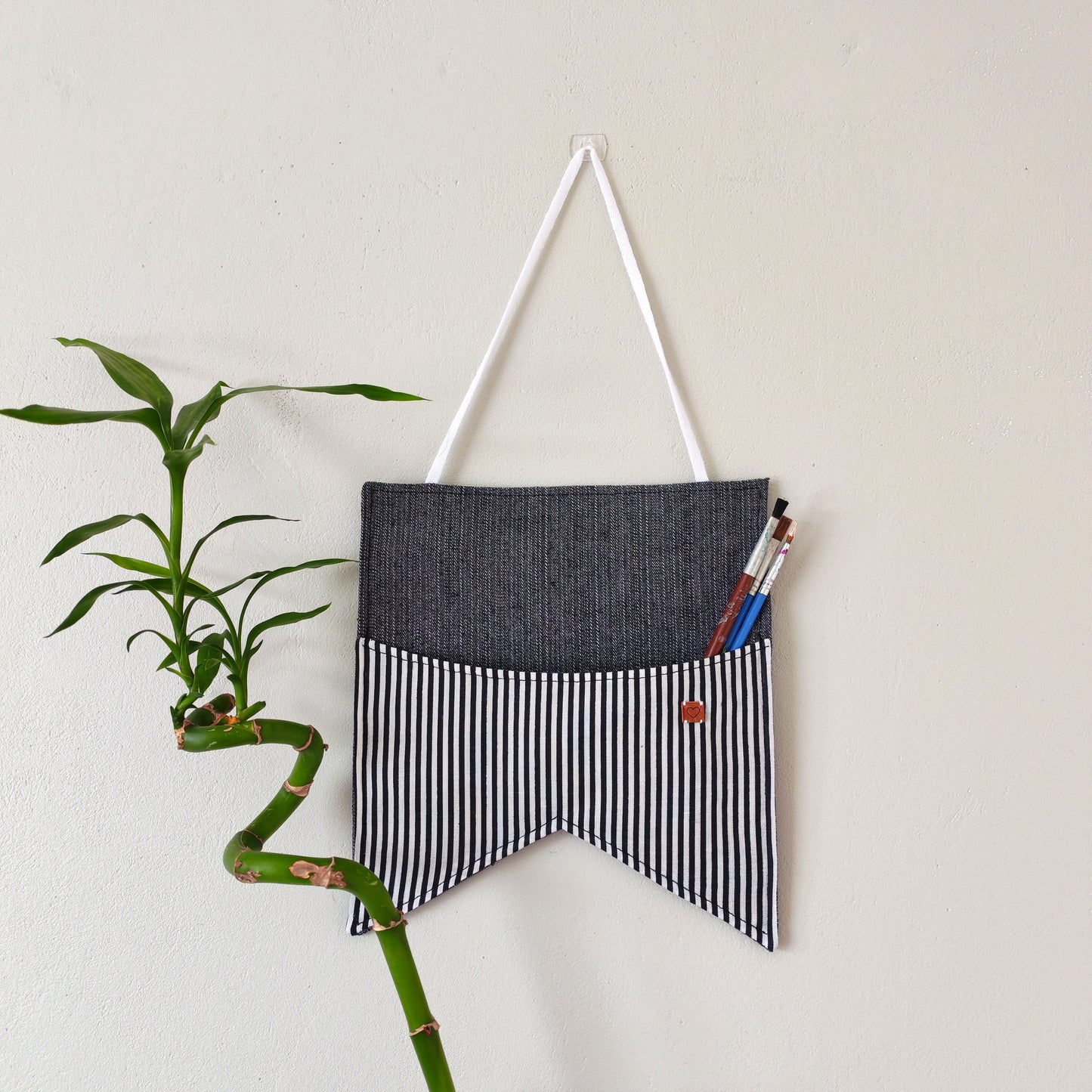 KÄTKÖ Pieni seinätaskubanneri